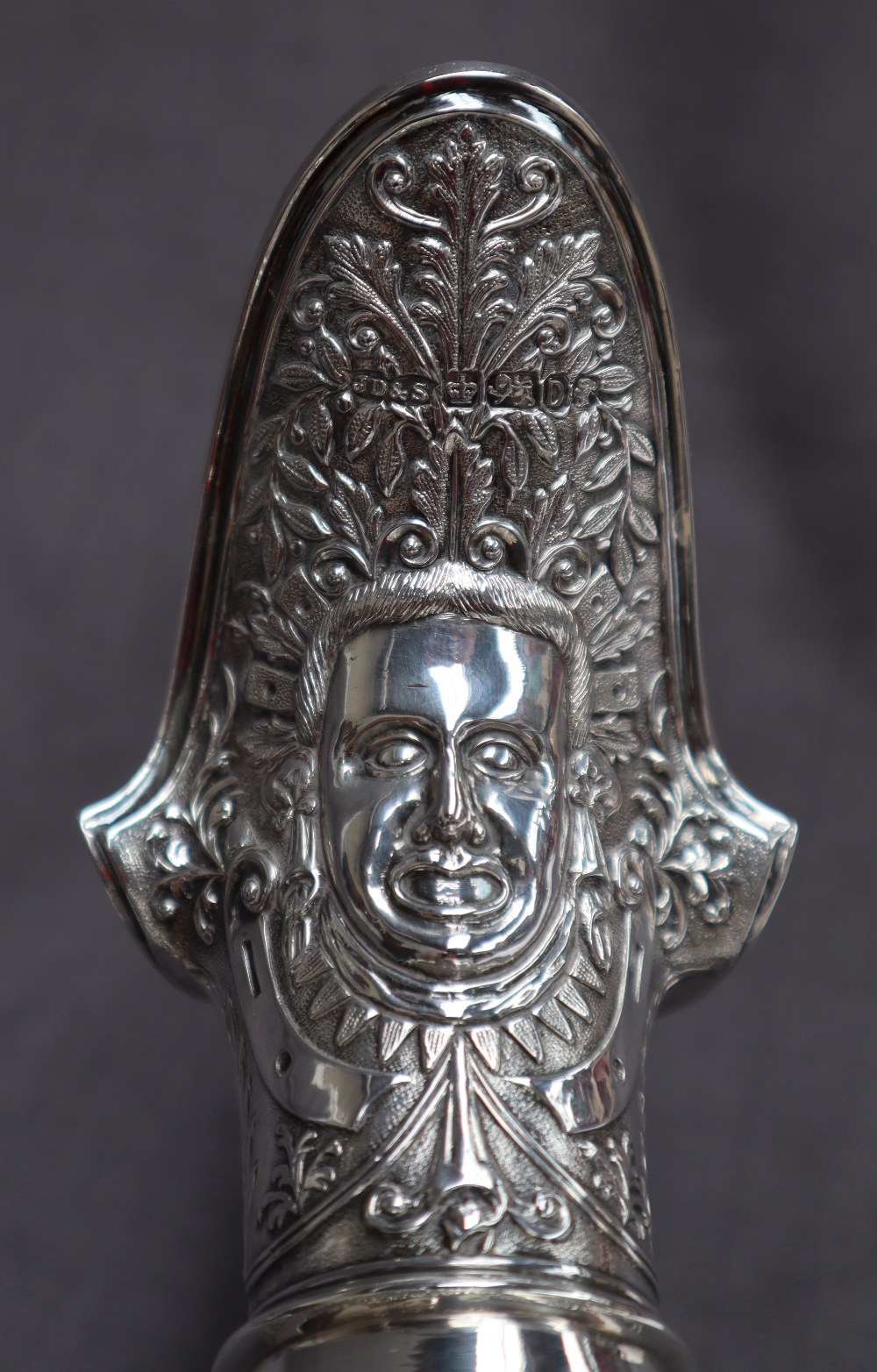 A Victorian silver claret jug, after Cellini, all over decoration of masks and rams, - Image 10 of 13