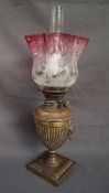 A Victorian oil lamp, the graded etched glass shade,