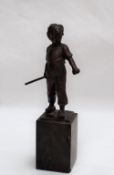 Paul Ludwig Kowalczewski A young boy holding a stick Bronze on a pedestal base Signed 15cm high