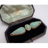 A Victorian yellow metal turquoise set bar brooch, of double teardrop shape, cased,