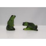 Two Lalique green glass frogs,