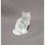 A Lalique glass model of a seated cat, script mark to the base "Lalique France",