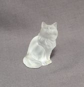 A Lalique glass model of a seated cat, script mark to the base "Lalique France",