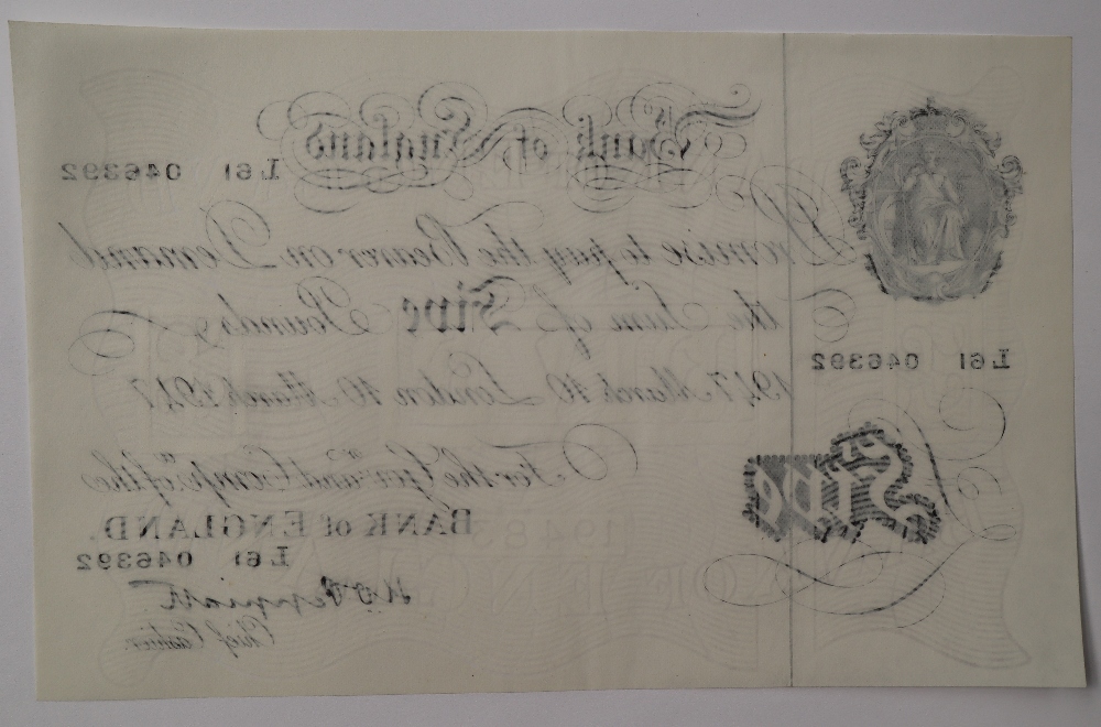 A Bank of England white Five Pounds note, Kenneth Oswald Peppiatt, London, dated 10th March 1947, - Image 2 of 2