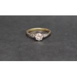 A solitaire diamond ring, the round brilliant cut diamond approximately 0.