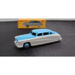 A Dinky Toys diecast model of a Hudson Commodore Sedan, with a two tone highline body,