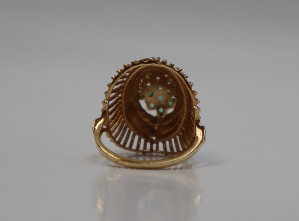 A 14ct yellow gold dress ring, set with a cluster of light green stones, possibly peridot, - Image 3 of 6