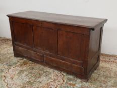 A large 18th century oak coffer,