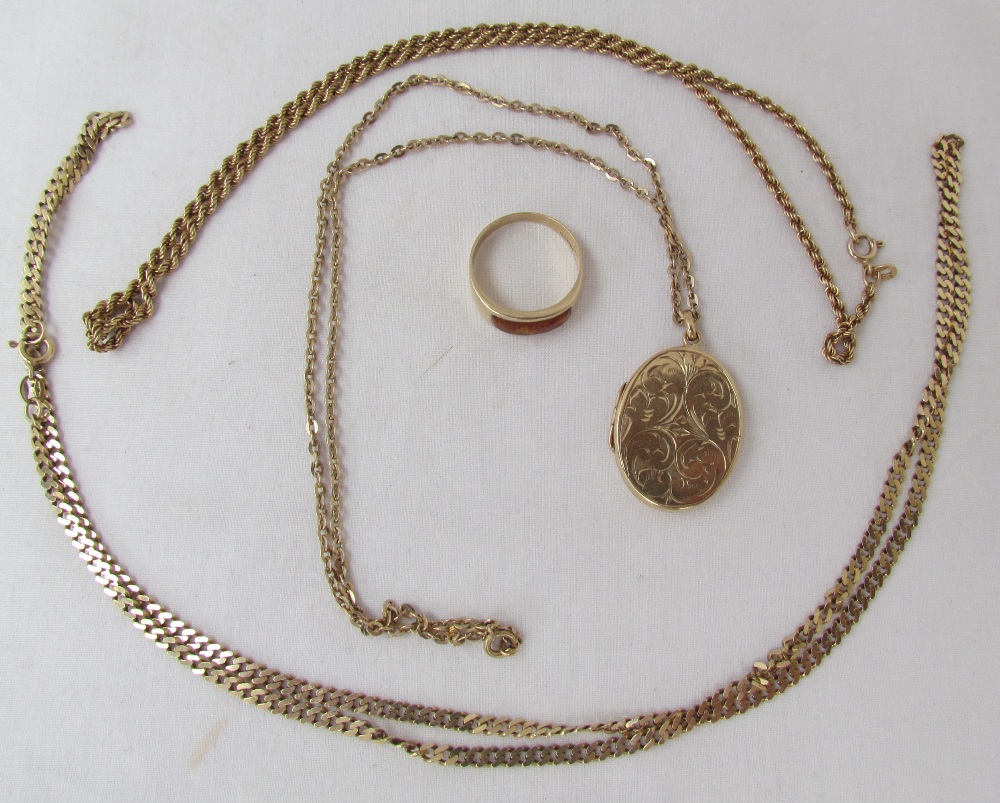 A 9ct yellow gold locket of oval form on a 9ct gold chain,