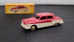 A Dinky Toys diecast model of a Studebaker Land Cruiser,
