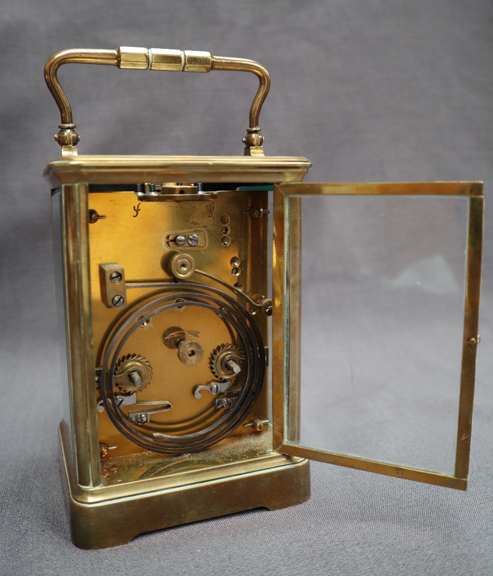 A French brass carriage clock, with a shaped handle and insight platform escapement, - Image 4 of 5