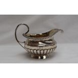 A George III silver cream jug,