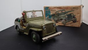 A Japanese tinplate battery operated Army commando Jeep,