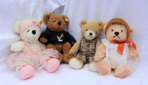 A modern Steiff teddy bear together with a Steiff ballerina and two other Steiff teddy bears