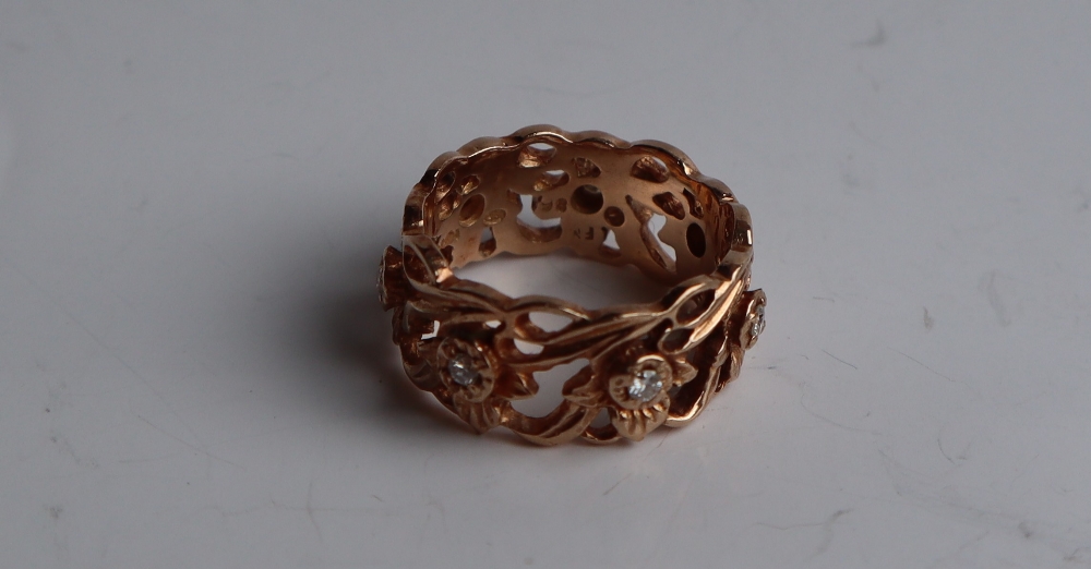 A 14ct yellow gold ring pierced with flowers and leaves set with round brilliant cut diamonds, - Image 4 of 6