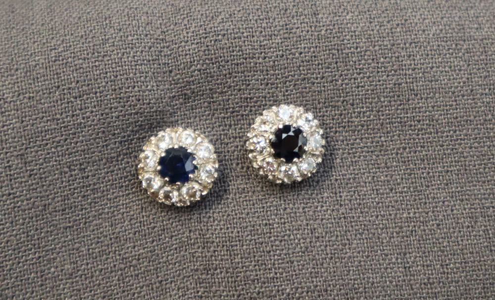 A pair of sapphire and diamond cluster earrings,