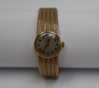 A Lady's 9ct yellow gold Omega wristwatch,