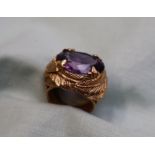 An amethyst dress ring, the oval faceted amethyst approximately 18mm x 13mm,