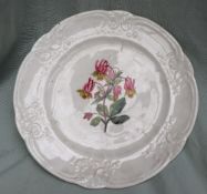 A Nantgarw porcelain plate, with a moulded shaped edge,