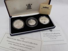 A Royal Mint 1994 Three-coin silver proof collection commemorating the 50th Anniversary of the