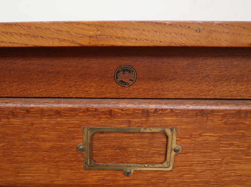 A 20th century oak plan chest, the rectangular top above six drawers on square legs, - Image 6 of 8