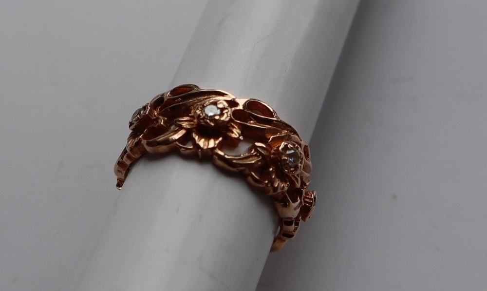 A 14ct yellow gold ring pierced with flowers and leaves set with round brilliant cut diamonds, - Image 3 of 6