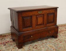 An 18th century oak coffer bach,