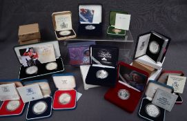 A collection of silver crowns including The Queen Mother Centenary Year,