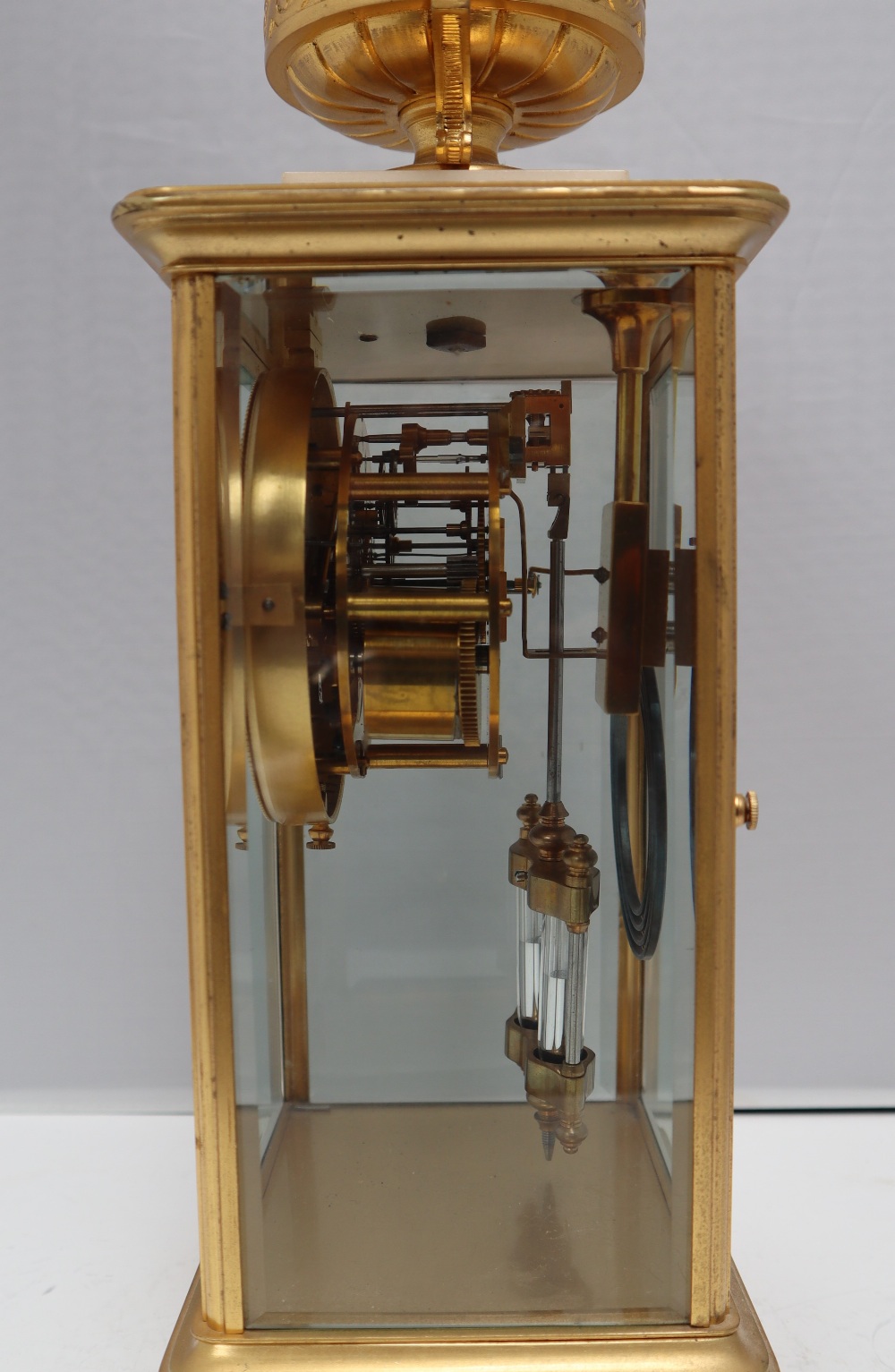 A 19th Century French four glass mantle clock, with a gilt metal vase surmount, on a marble plinth, - Image 5 of 6