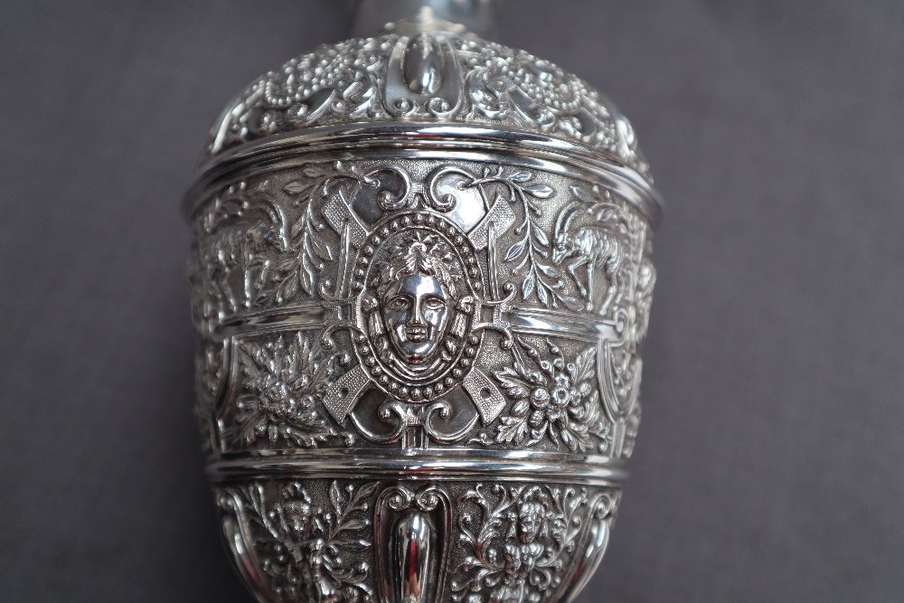 A Victorian silver claret jug, after Cellini, all over decoration of masks and rams, - Image 6 of 13