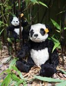 A Steiff panda teddy bear, with articulated limbs,