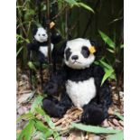 A Steiff panda teddy bear, with articulated limbs,