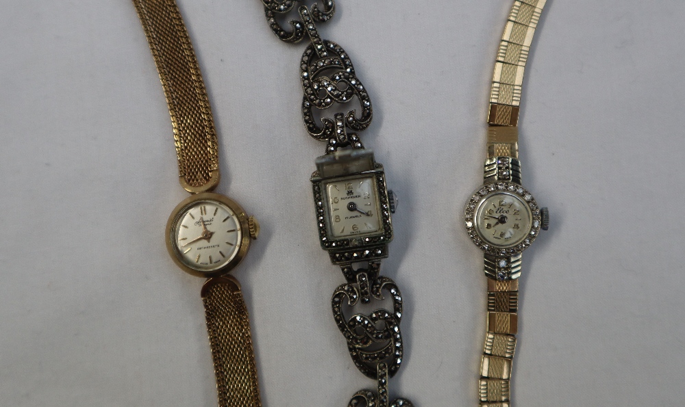 A Lady's 9ct yellow gold and diamond encrusted cocktail watch,