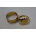 An 18ct yellow gold wedding band, size R together with an 18ct gold signet ring, size M 1/2,