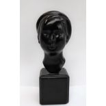 20th century An Indonesian beauty A bronze bust with black patina Signed with initials, H.S. V.N.