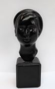 20th century An Indonesian beauty A bronze bust with black patina Signed with initials, H.S. V.N.