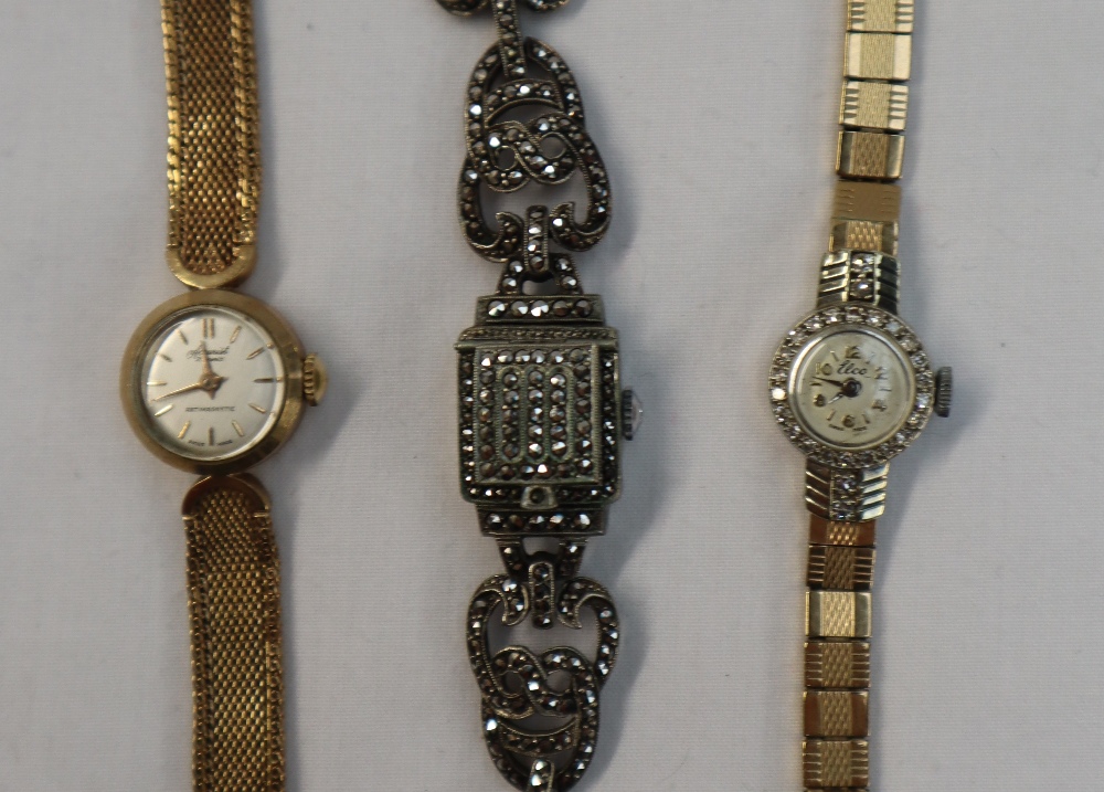 A Lady's 9ct yellow gold and diamond encrusted cocktail watch, - Image 2 of 5