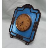 A George V silver and blue enamel decorated desk clock,