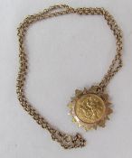 A George V gold sovereign dated 1912, mounted in a 9ct gold slip mount on a 9ct gold chain,