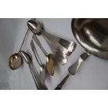 A set of seven continental white metal table spoons, each marked HA HA,