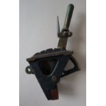 A bronze mini power box lever, with a spring loaded handle and four divisions, impressed F230,