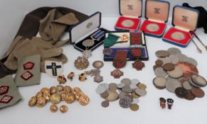 A National Service medal together with military buttons, epaulettes, silver crowns,