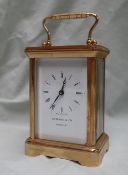 A 20th century English brass cased carriage clock,