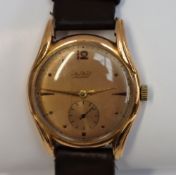 A Gentleman's 18ct yellow gold Aero Watch, the gilt dial with Arabic numerals,