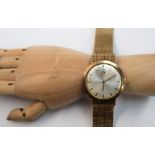 A Gentleman's 9ct yellow gold Omega wristwatch,