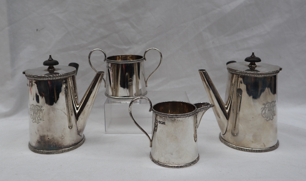 A George V silver four piece set comprising a pair of chocolate pots, - Image 2 of 15