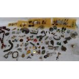 Assorted costume jewellery including earrings, brooches, cufflinks, dress studs, necklaces,