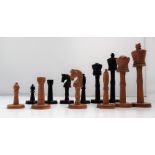 A turned treen chess set, with a ring turned and ball column,