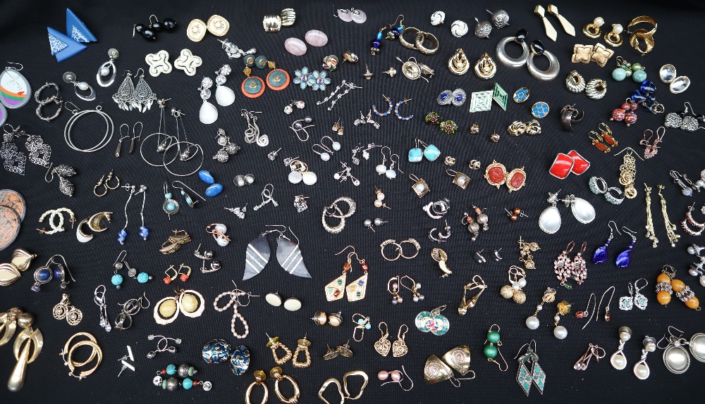 An assortment of fashion earrings,