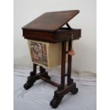 An early Victorian rosewood work table, the hinged top with stay and frieze drawer,